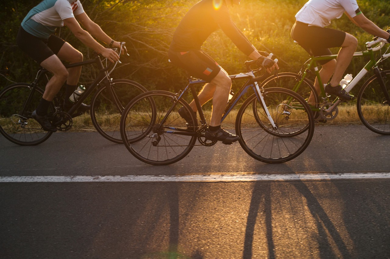 Action shot of cyclists riding hard.
